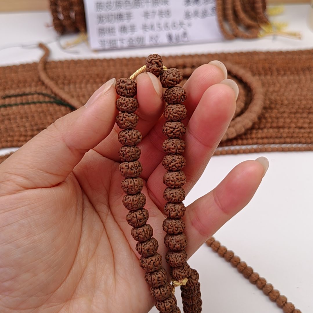 金刚菩提手串平细脖挂褐色下水紫红色玉化料子乌里达产区