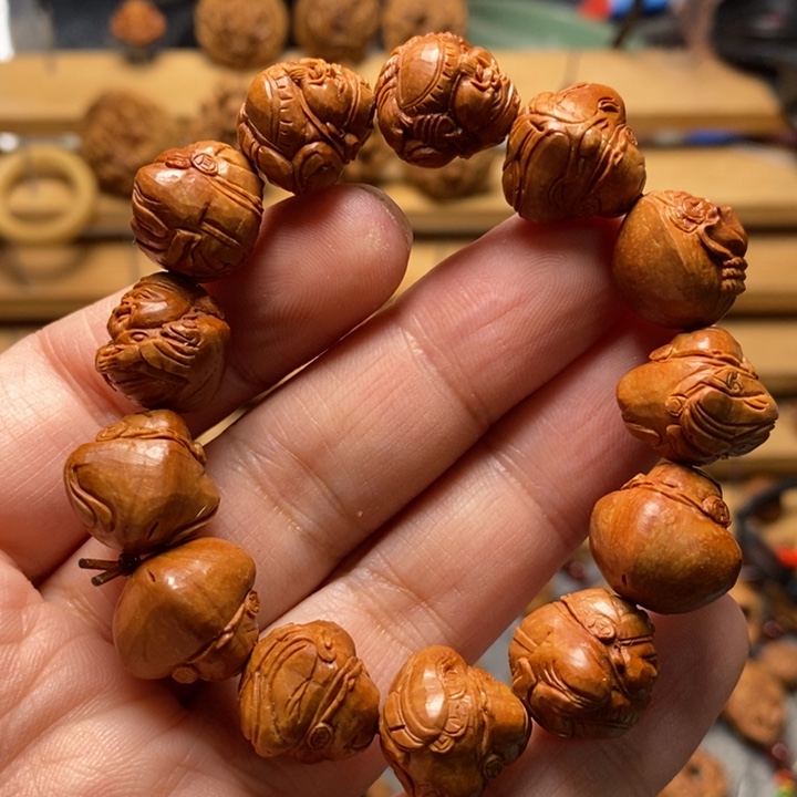盗***道桃核手工雕刻财神手串