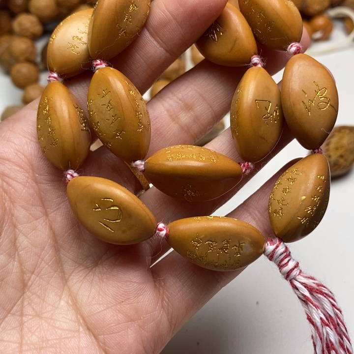 吊坠橄榄核心经手持