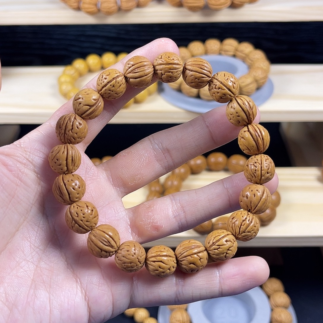 手串桃核红皮野生桃核原皮油质好