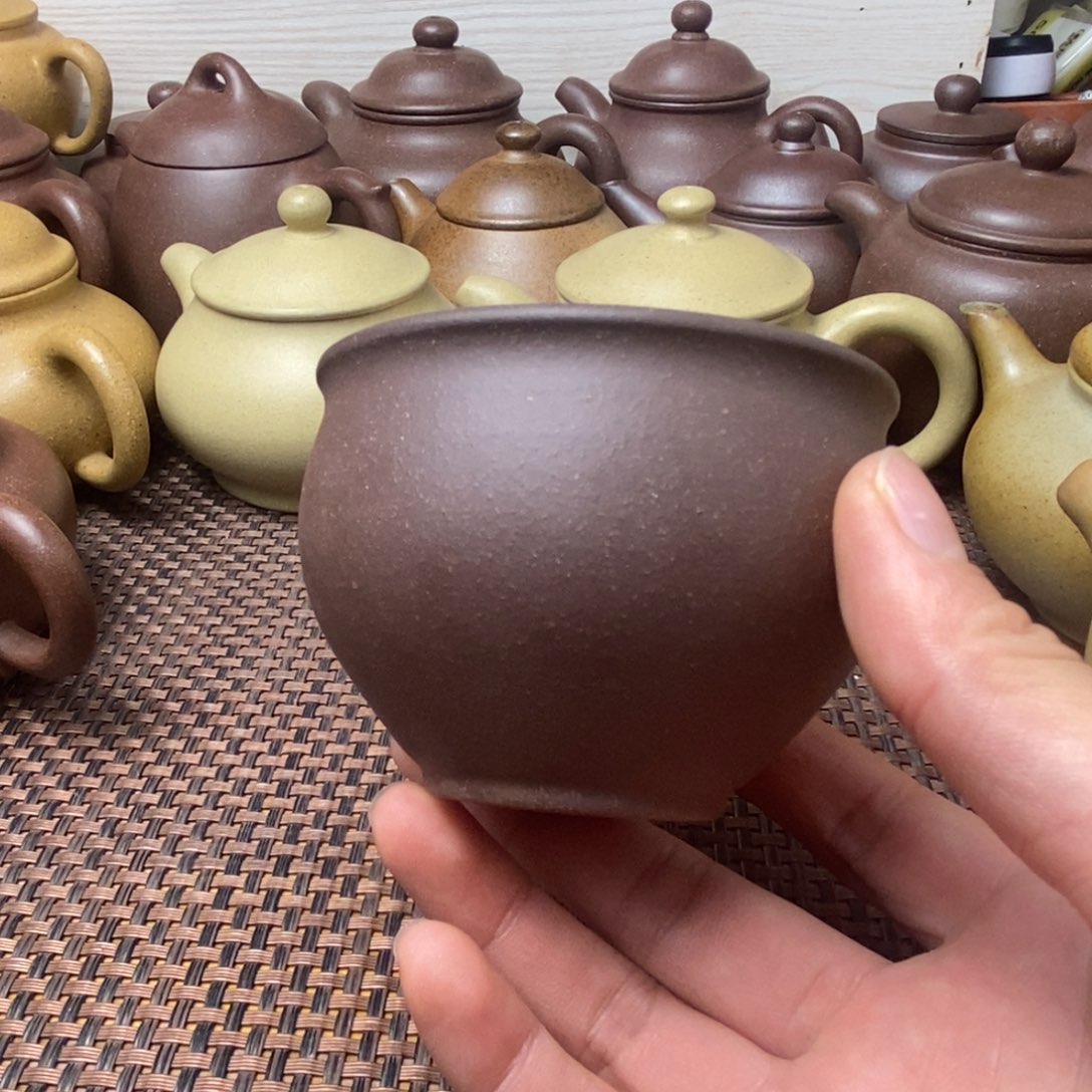 紫砂茶壶像****由紫砂主人杯