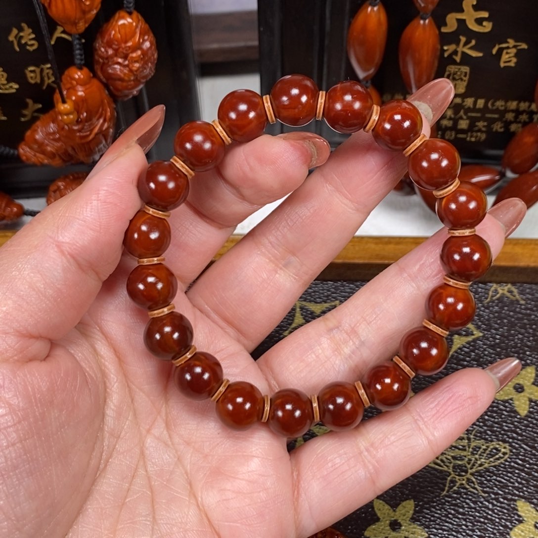 来***来橄榄核吊坠光珠111111