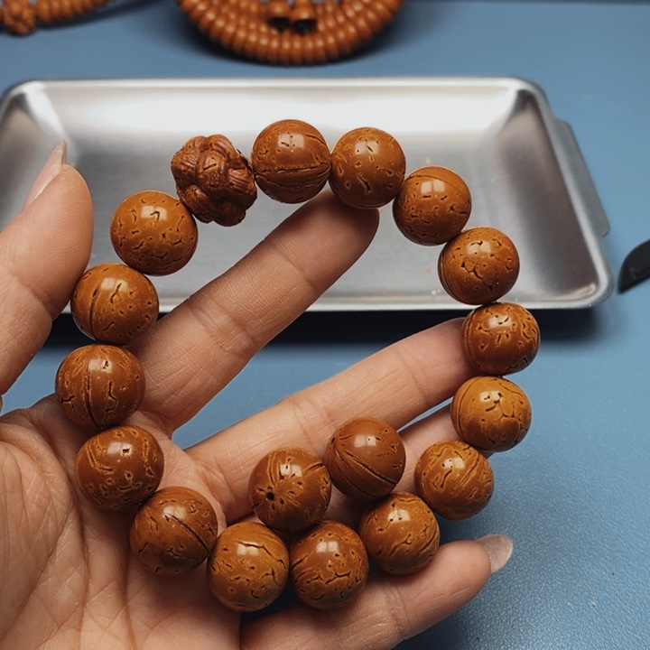 桃核手串极限圆16花皮色差15颗