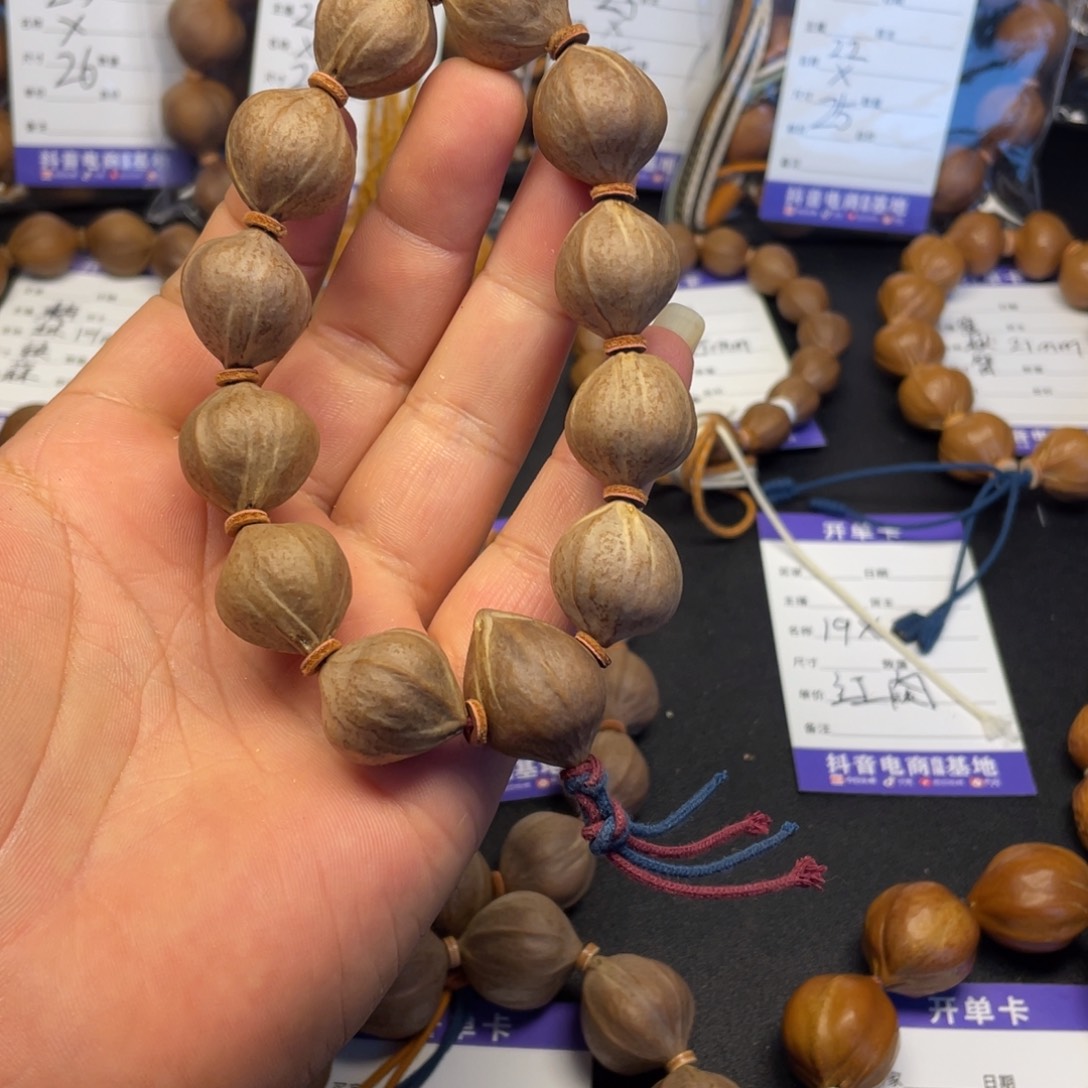 ****筒橄榄核手串红肉19mm