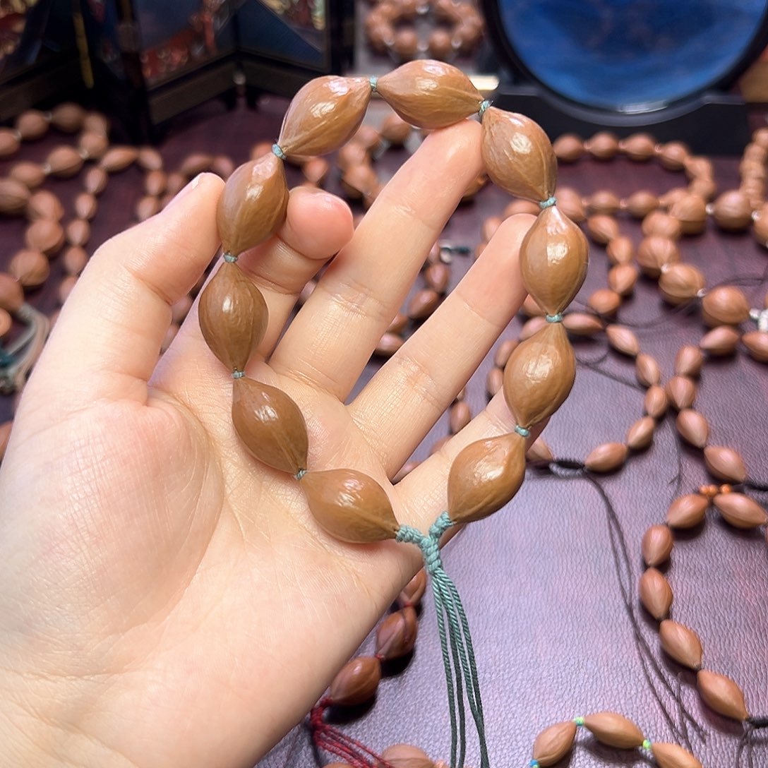 沪***拉手串/手链橄榄核油 胖圆 1.5 2.4左右