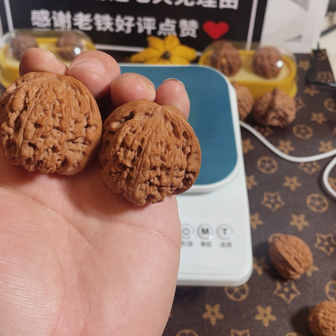 桃核吊坠H**t南疆赵喜满
