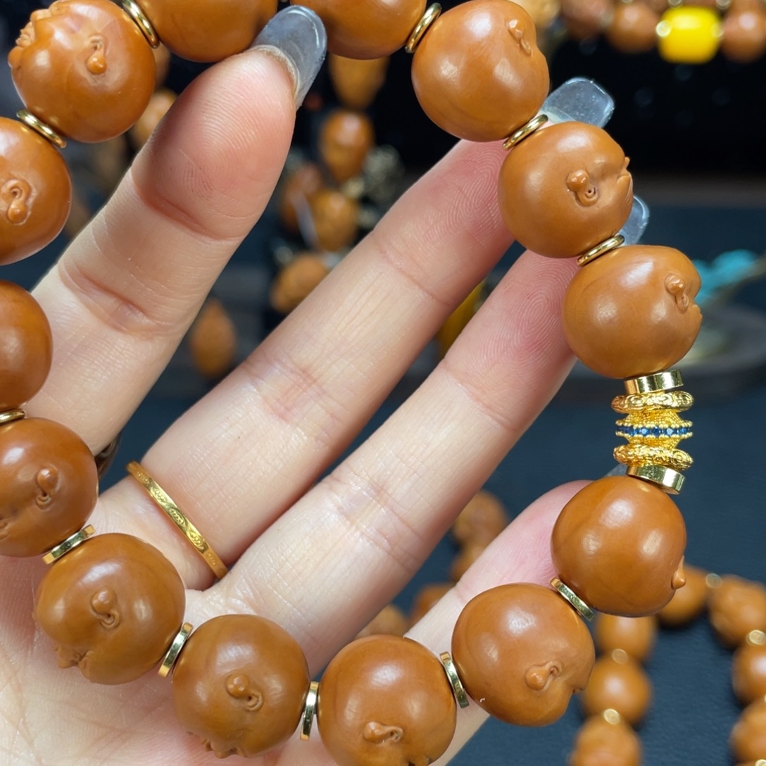 手串橄榄核百态人生