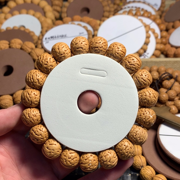 独***白桃核手串22#红皮金丹