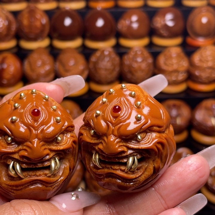 橄榄核把件金****化橄榄雕刻