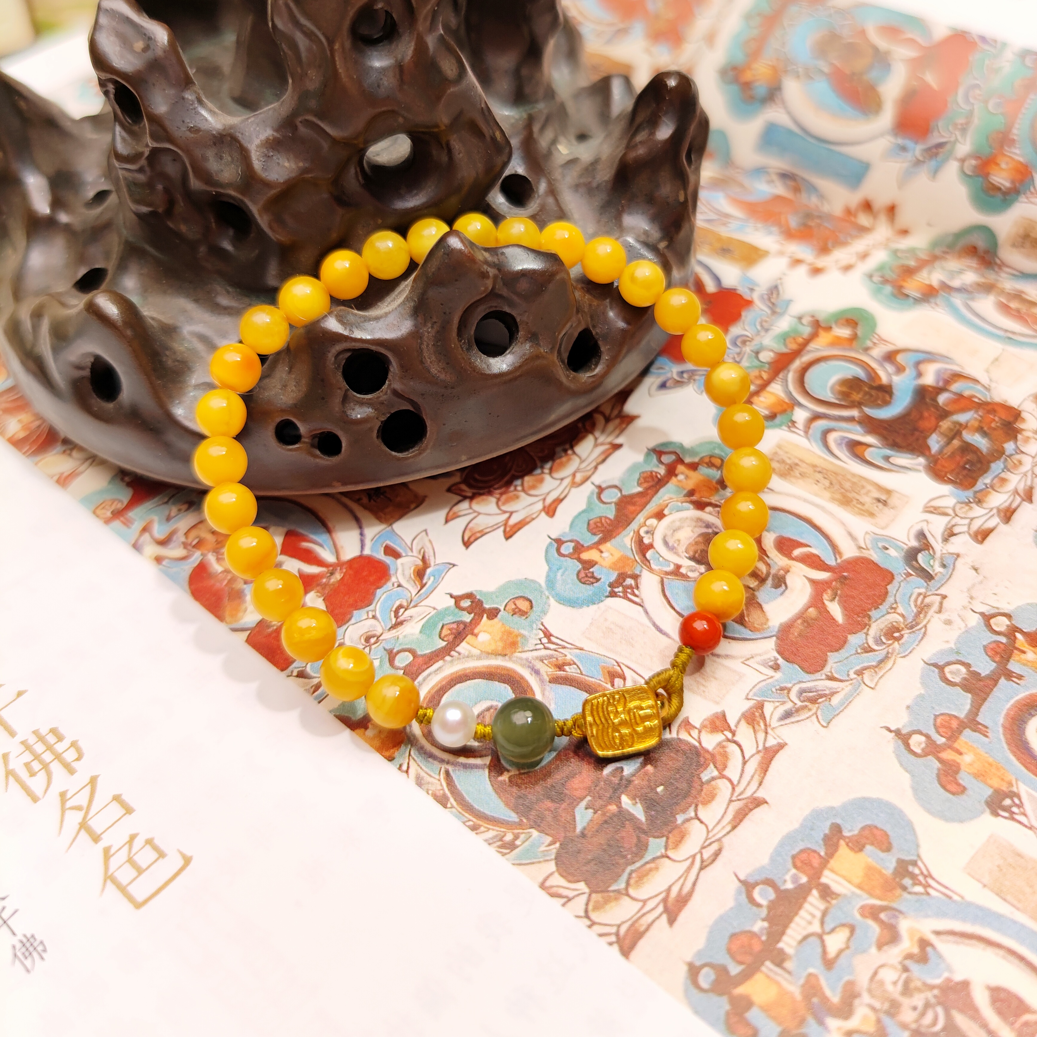 《扎基拉姆蜜蜡售价95》知余原创蜜蜡手串s925银镀金