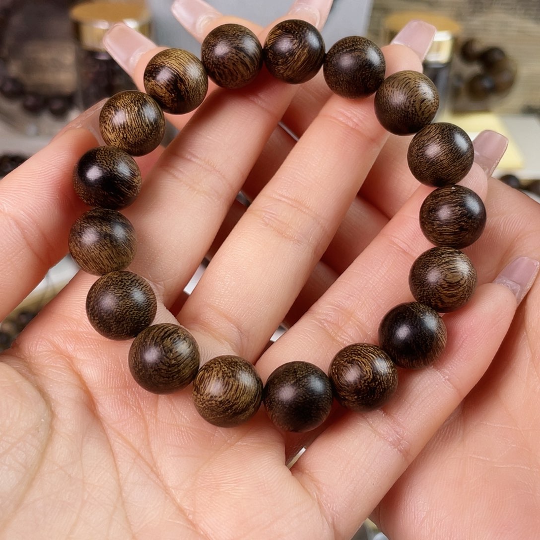 沉香手串杜****店越南芽庄老白棋玉化老料满瘤疤虎斑1.2