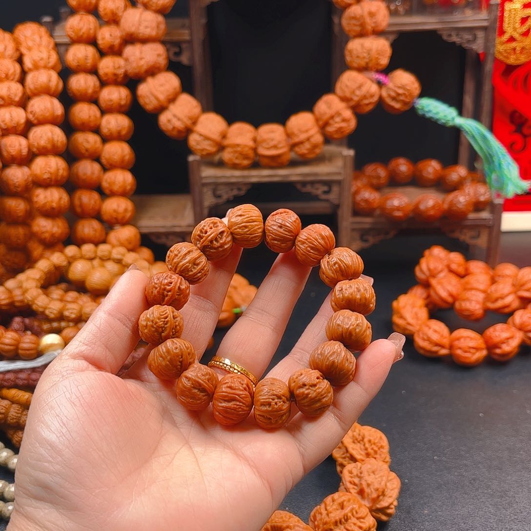 文玩核桃吊坠深**明核桃手串