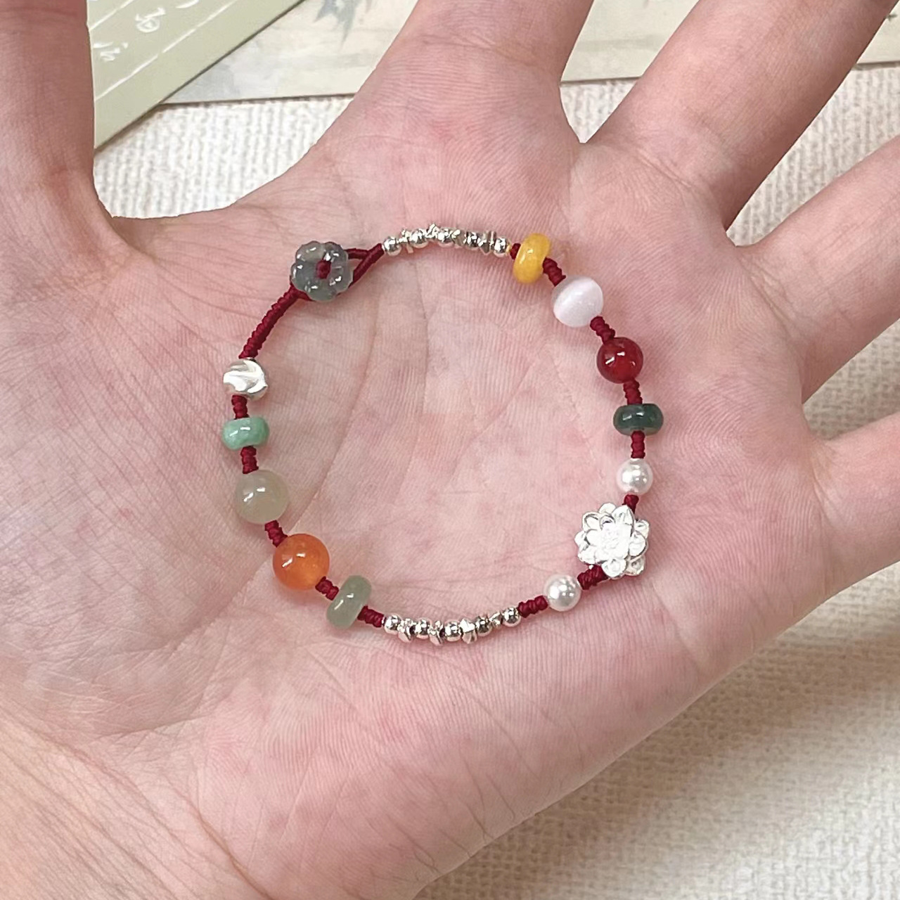 铜合金手链 梅姐饰品76 小莲花手链女编织红绳手绳时尚百搭手饰