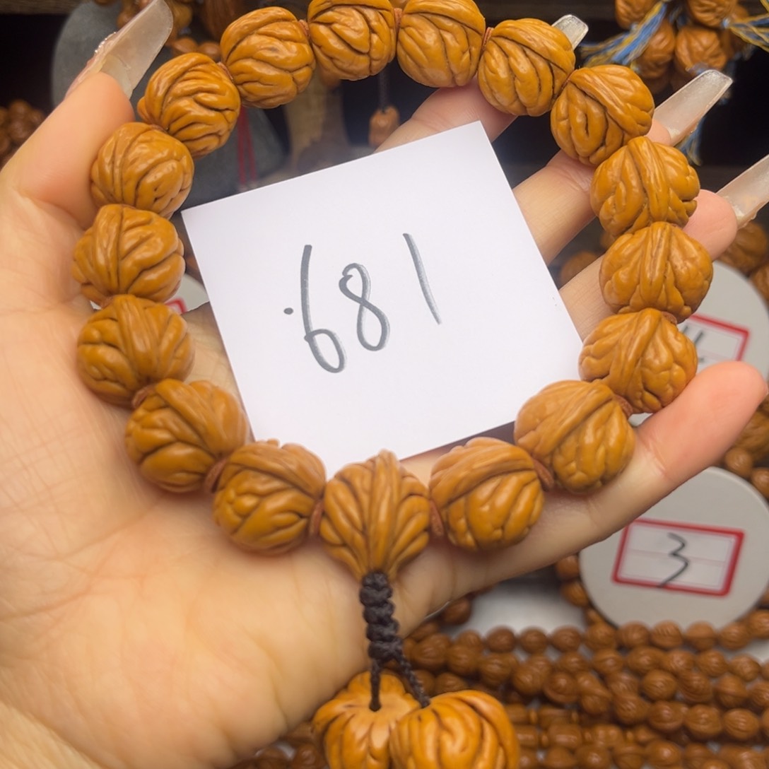 吊坠桃核霸王龙手持