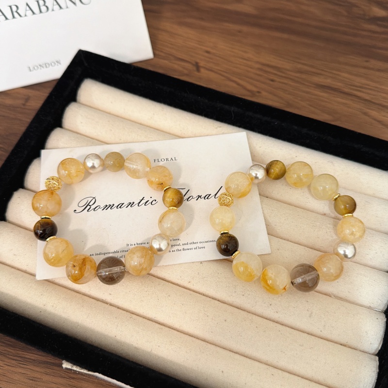 X2178黄胶花金虎眼茶晶手链高端轻奢手串多样性发一