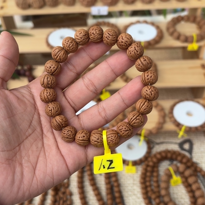 …***…木质非金属矮壮桃核手串