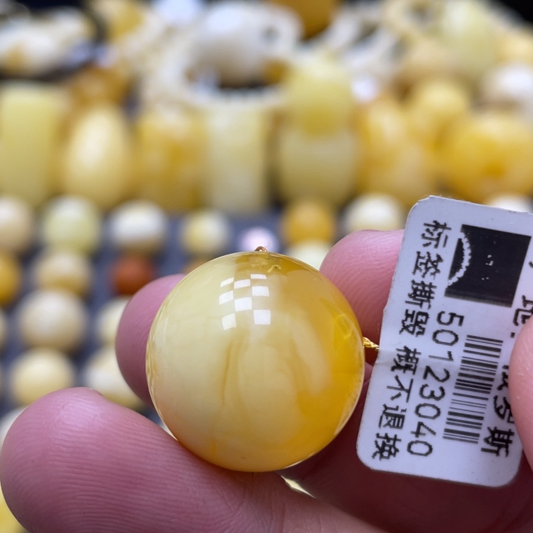 蜜蜡未镶嵌裸石18.9mm瑕