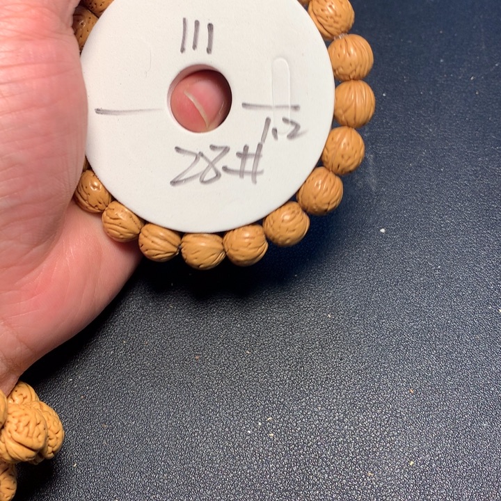 桃核手串28号健健康康了