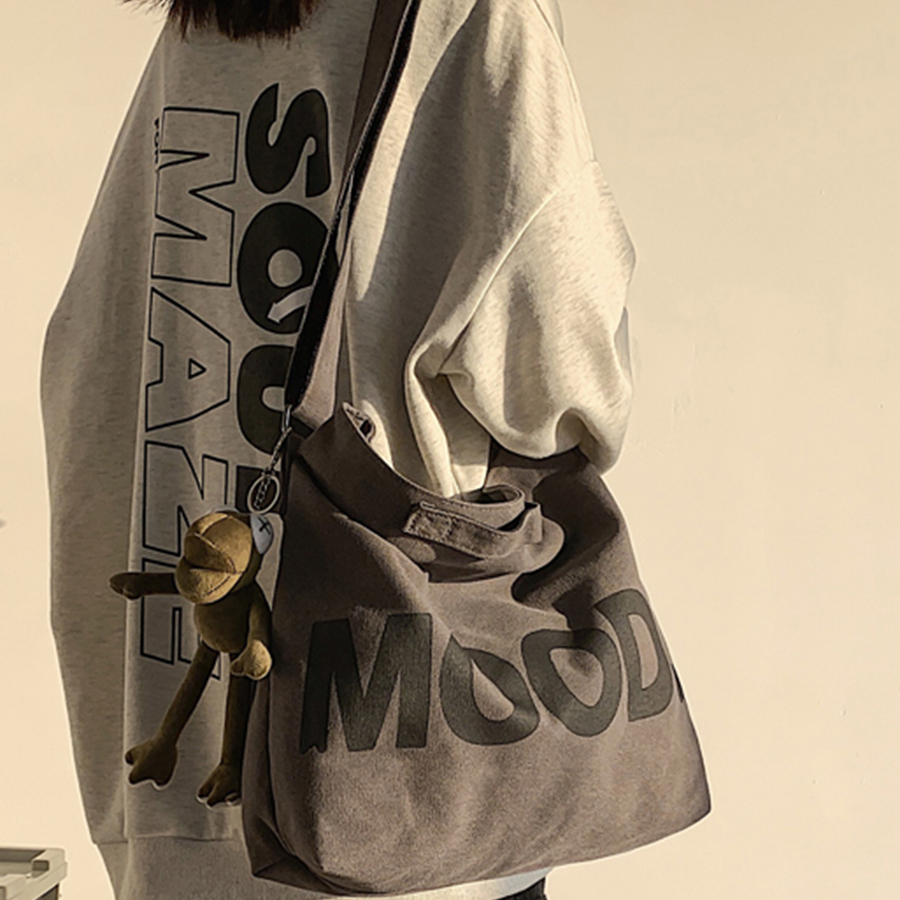 帆布包男斜挎包大容量日系男生斜跨背包女休闲邮差学生男士单肩mf