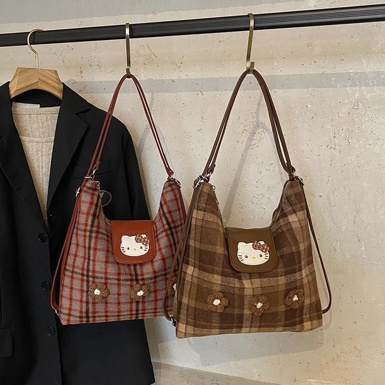 爆款可爱卡通双肩包包女2025新款小众多功能腋下包百搭休闲托特包