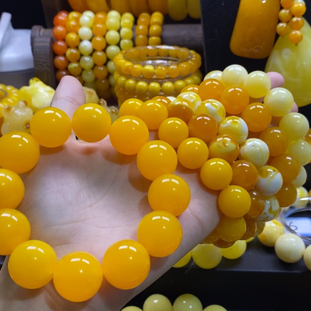 飞****非金属鸡油黄卡20精品手串