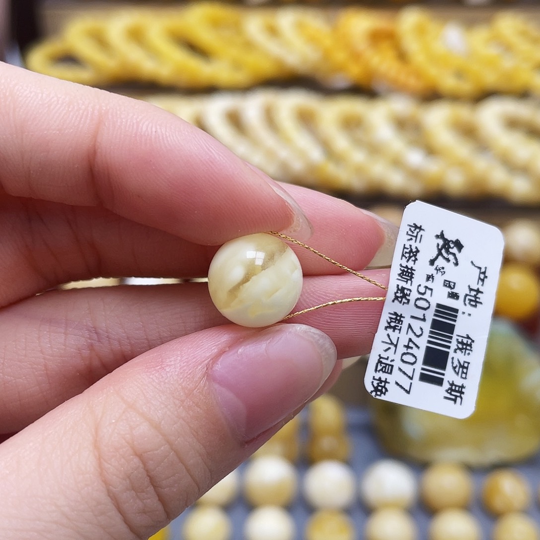 未镶嵌琥珀裸石蜜蜡圆珠11.3mm瑕疵
