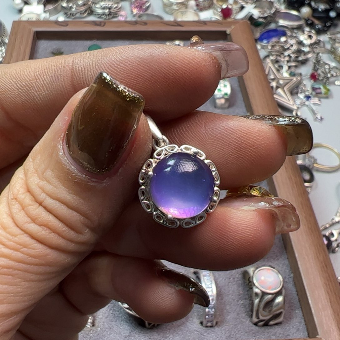 余***好铁合金925银饰吊坠一枚