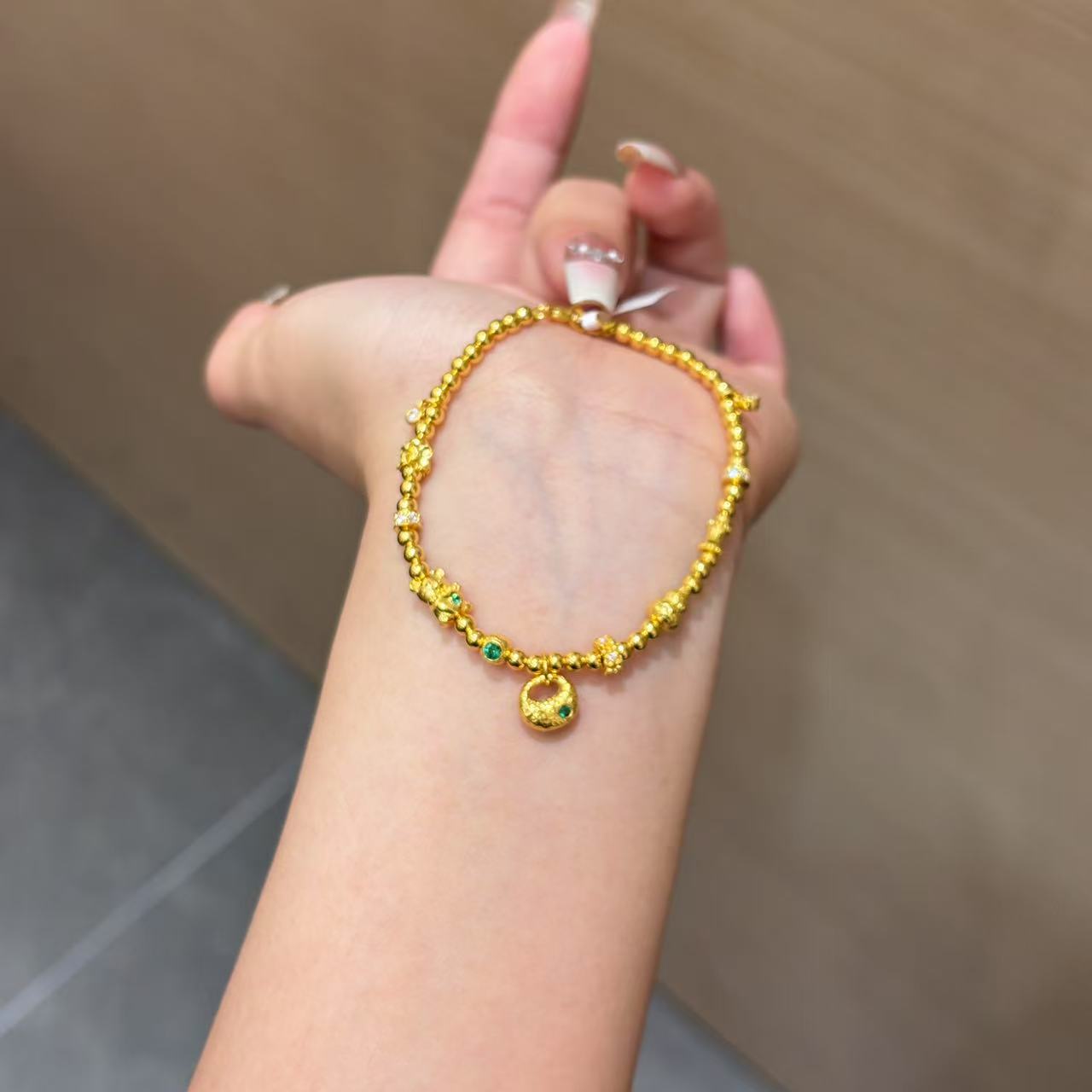 【菠萝珠宝】足金999 时尚点钻算盘珠小胖福手链 金重：11.06克