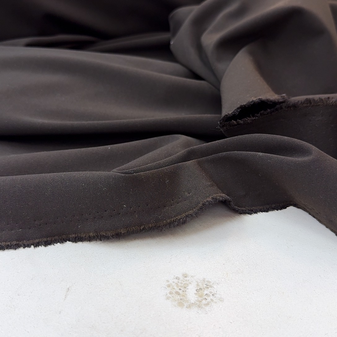 宝***颖混纺咖啡色弹力裤子面料0.5米