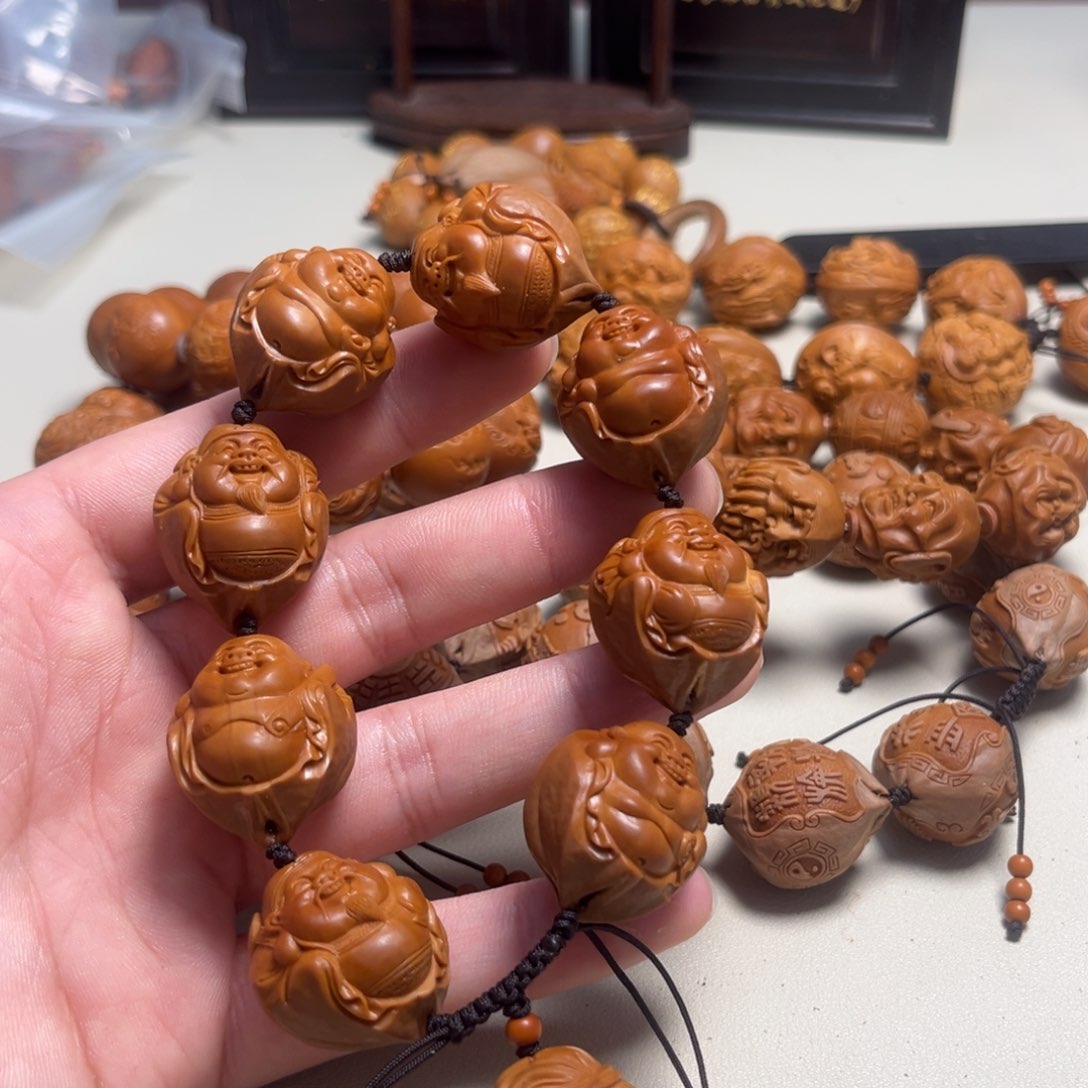 橄榄核吊坠h包衣财迷