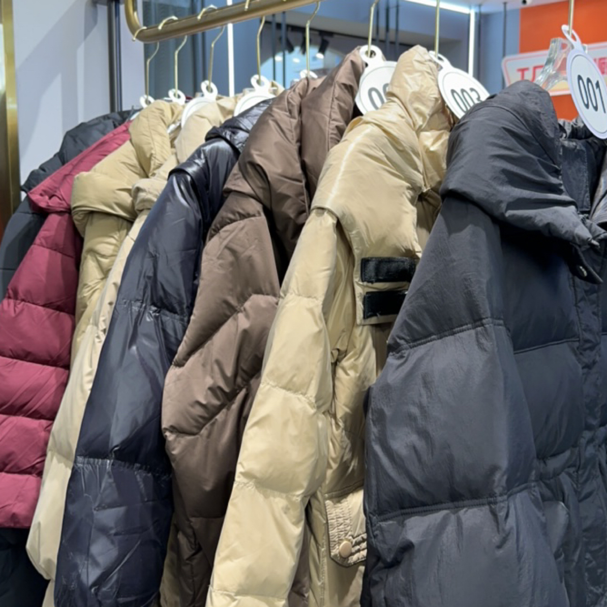 冬季新款加肥加大码针织拼接大翻领中长款保暖御寒羽绒