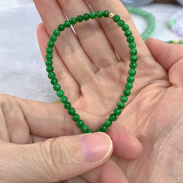 C***雨翡翠18K金镶嵌手串辣阳绿小米珠卡3.7