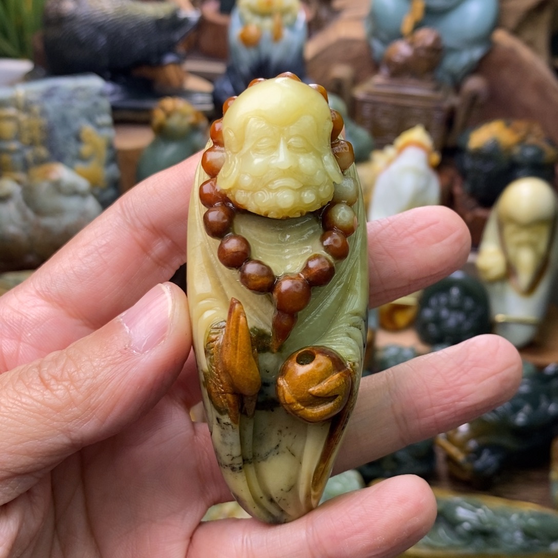 螺***丝蛇纹石玉未镶嵌手把件达摩