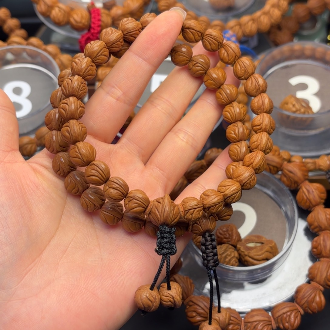 G***n桃核吊坠野生玉龙脊11手持2条