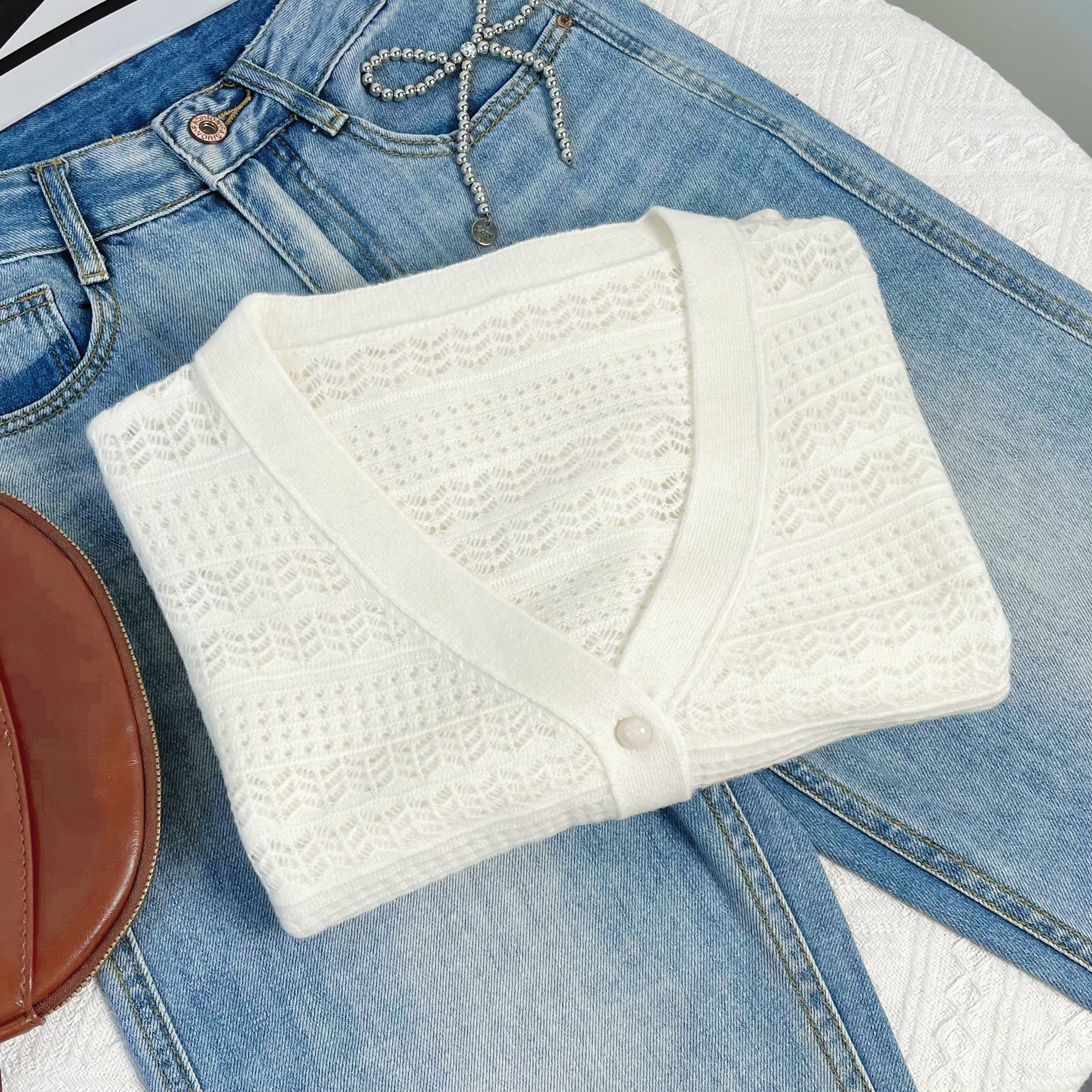 清-汤圆吖时尚V领镂空针织开衫292433