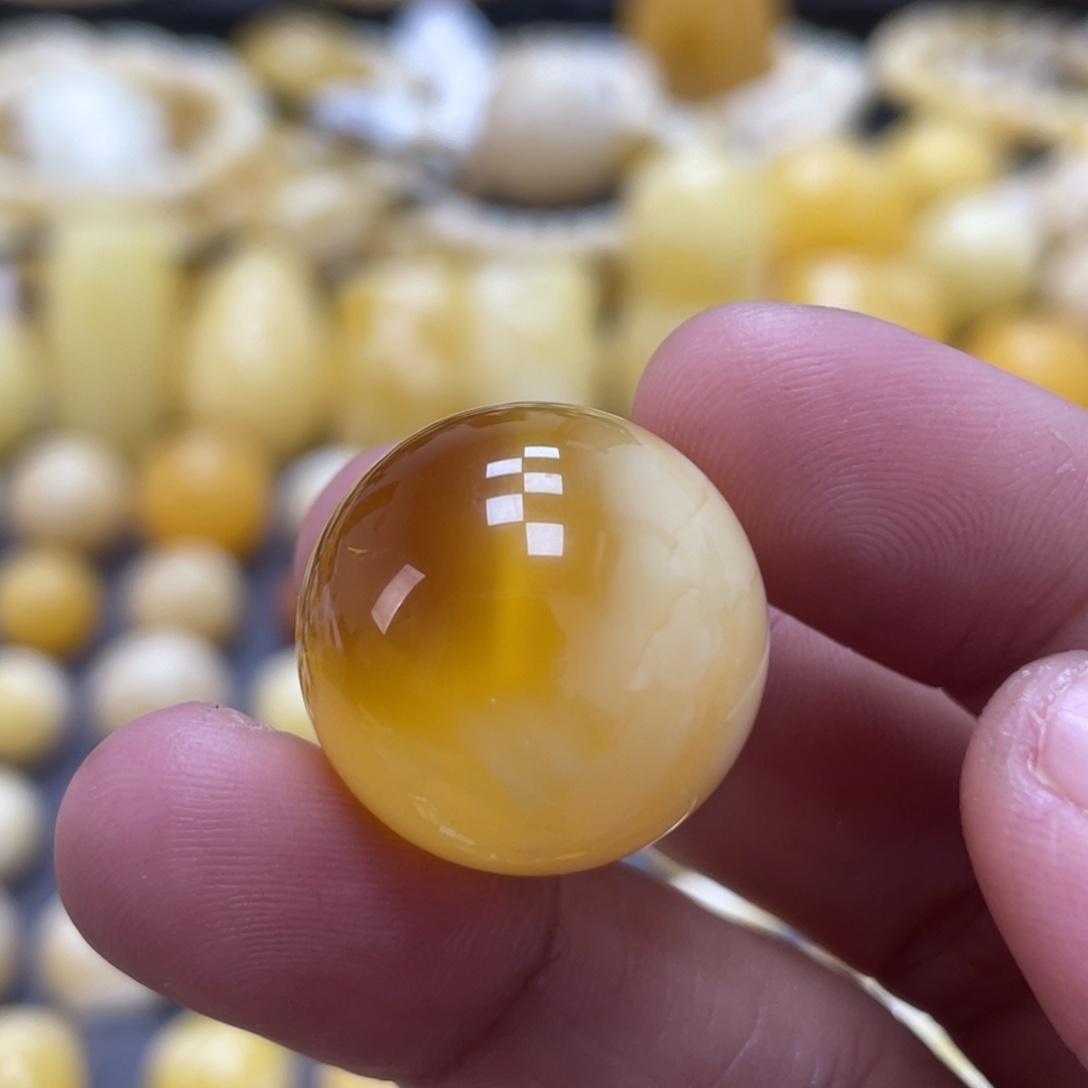 蜜蜡未镶嵌裸石21.4mm瑕疵金妖溶洞