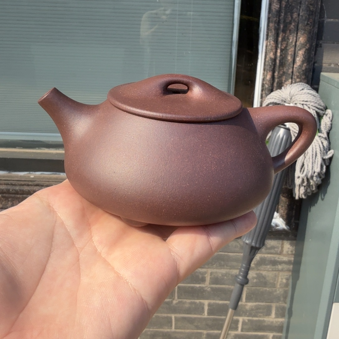 茶杯紫砂微瑕的壶