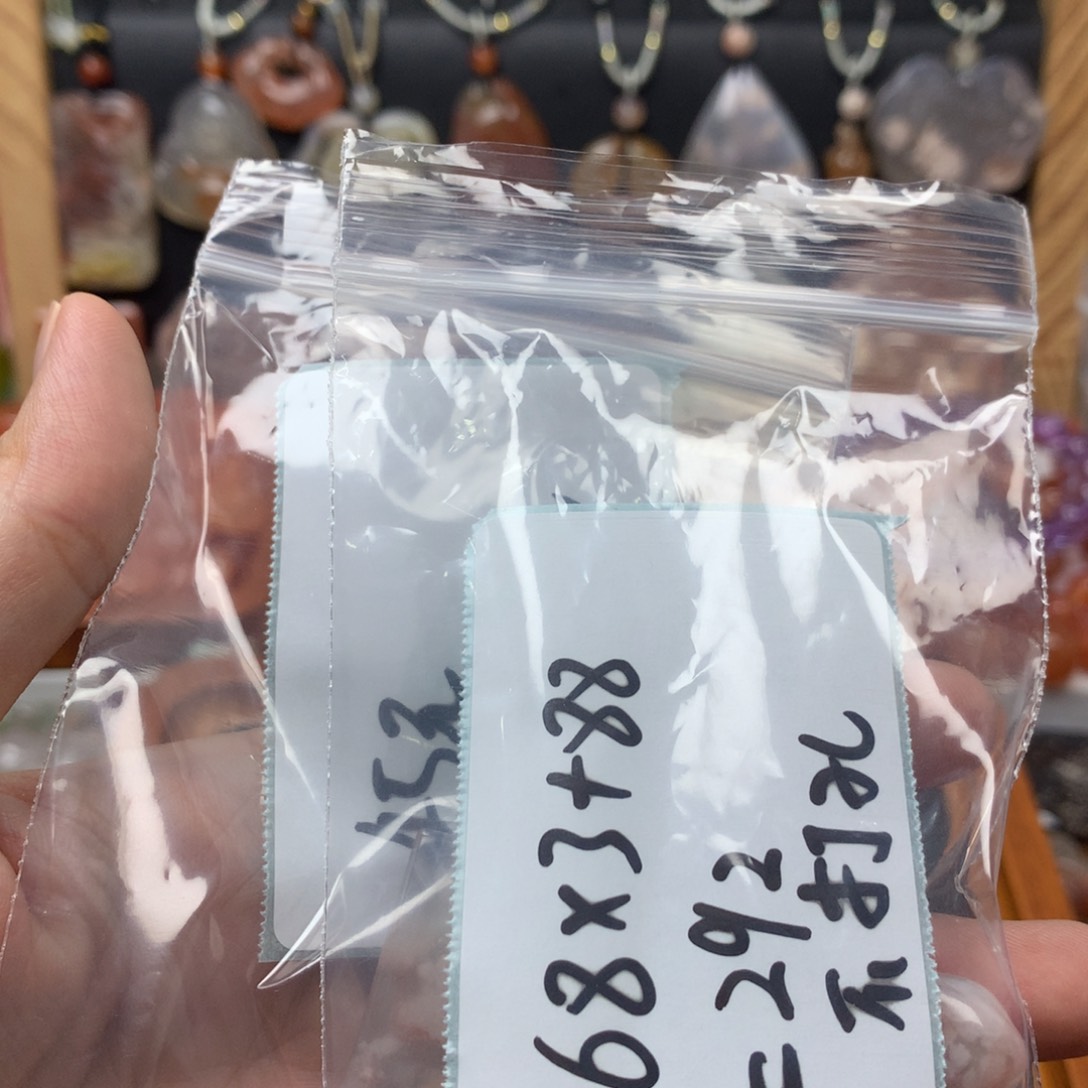 查罗石合金颈饰芋**牛