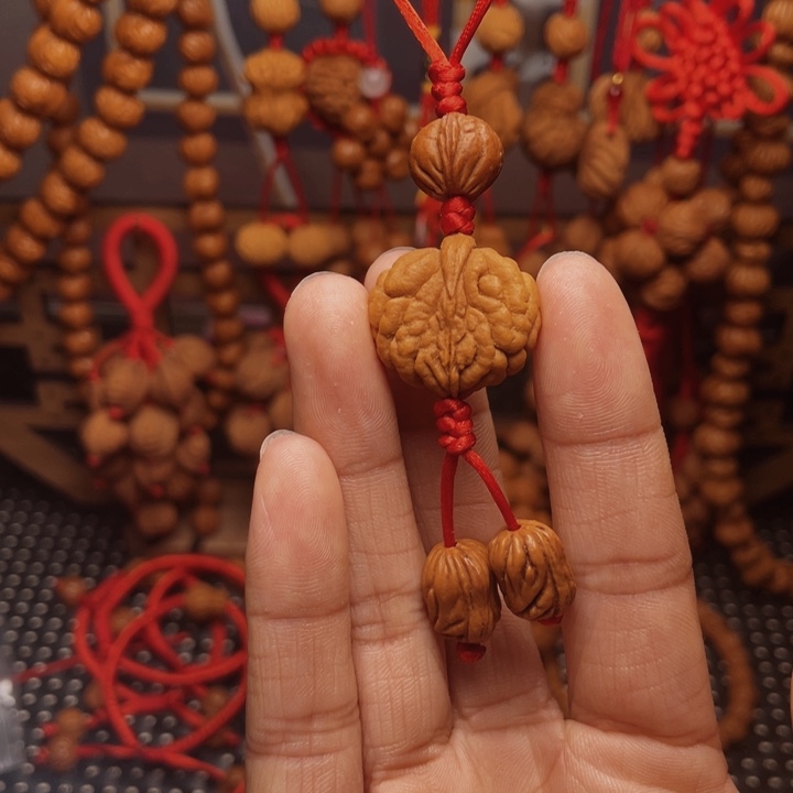 五***）木质类龙纹桃枭挂件