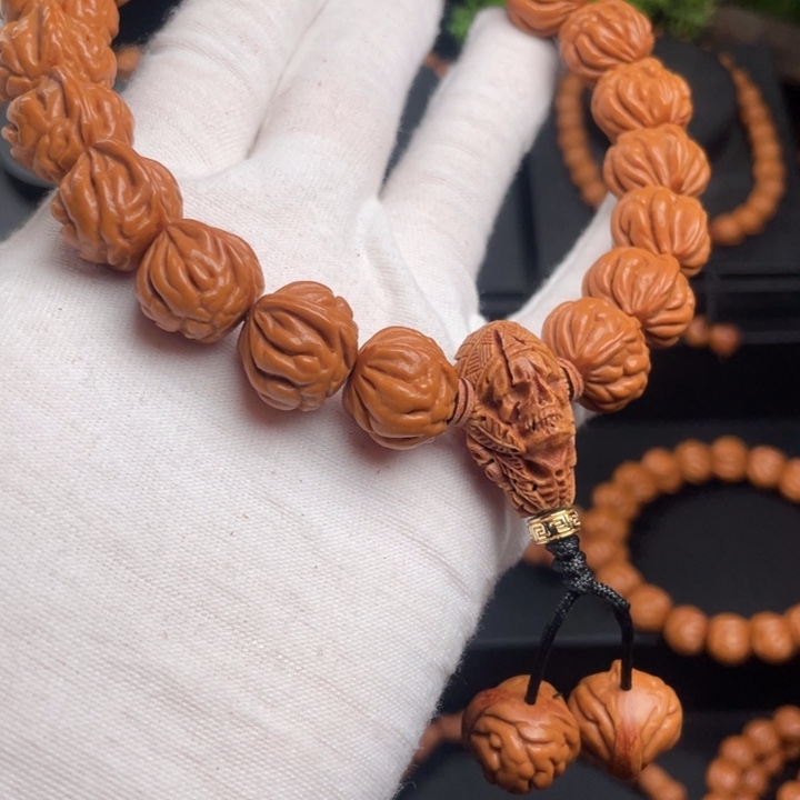 松***人木质类精品桃核手持