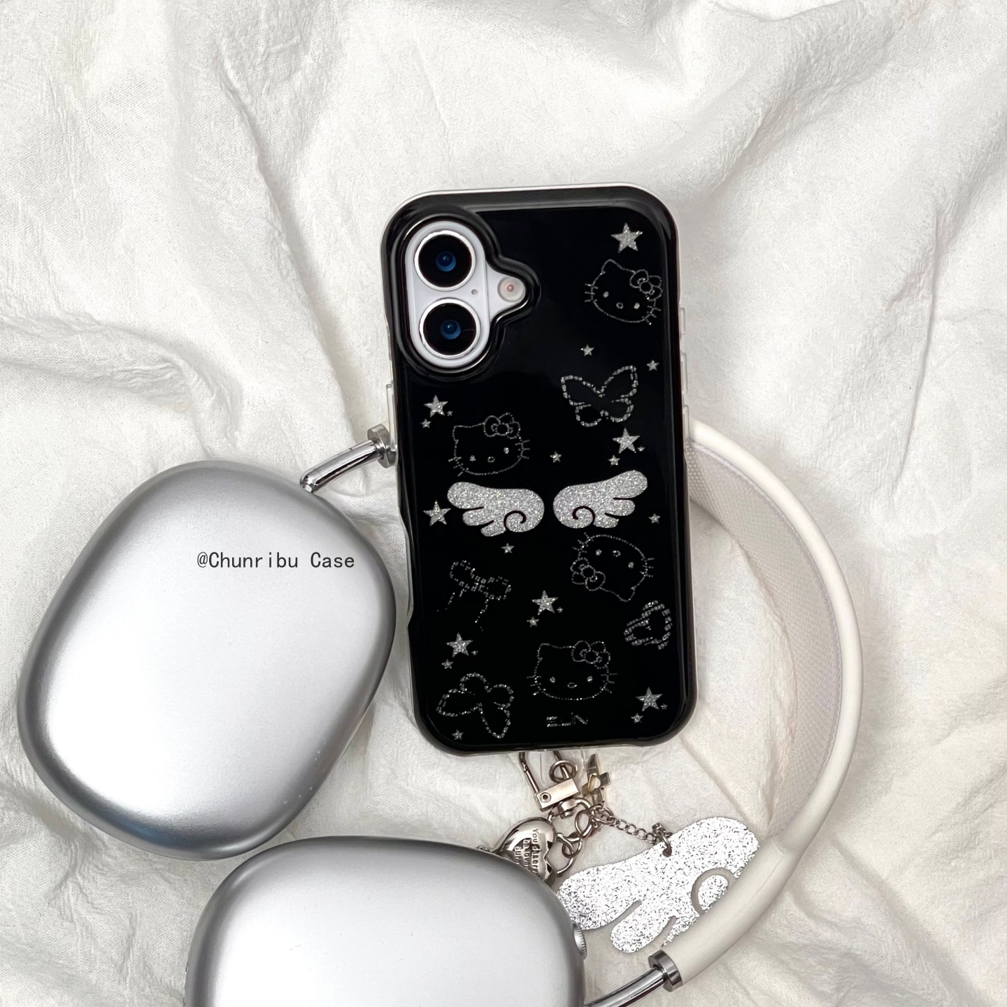 可爱卡通黑底闪闪翅膀kitty适用苹果17/16promax手机壳15/14/13