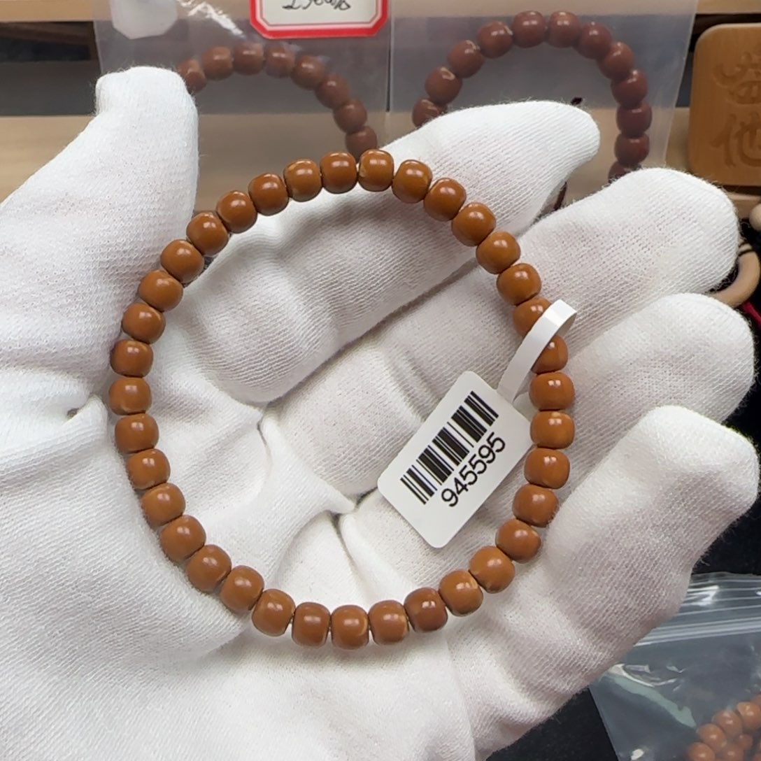 手串橄榄核老挝单圈极限弧三花6.2mm