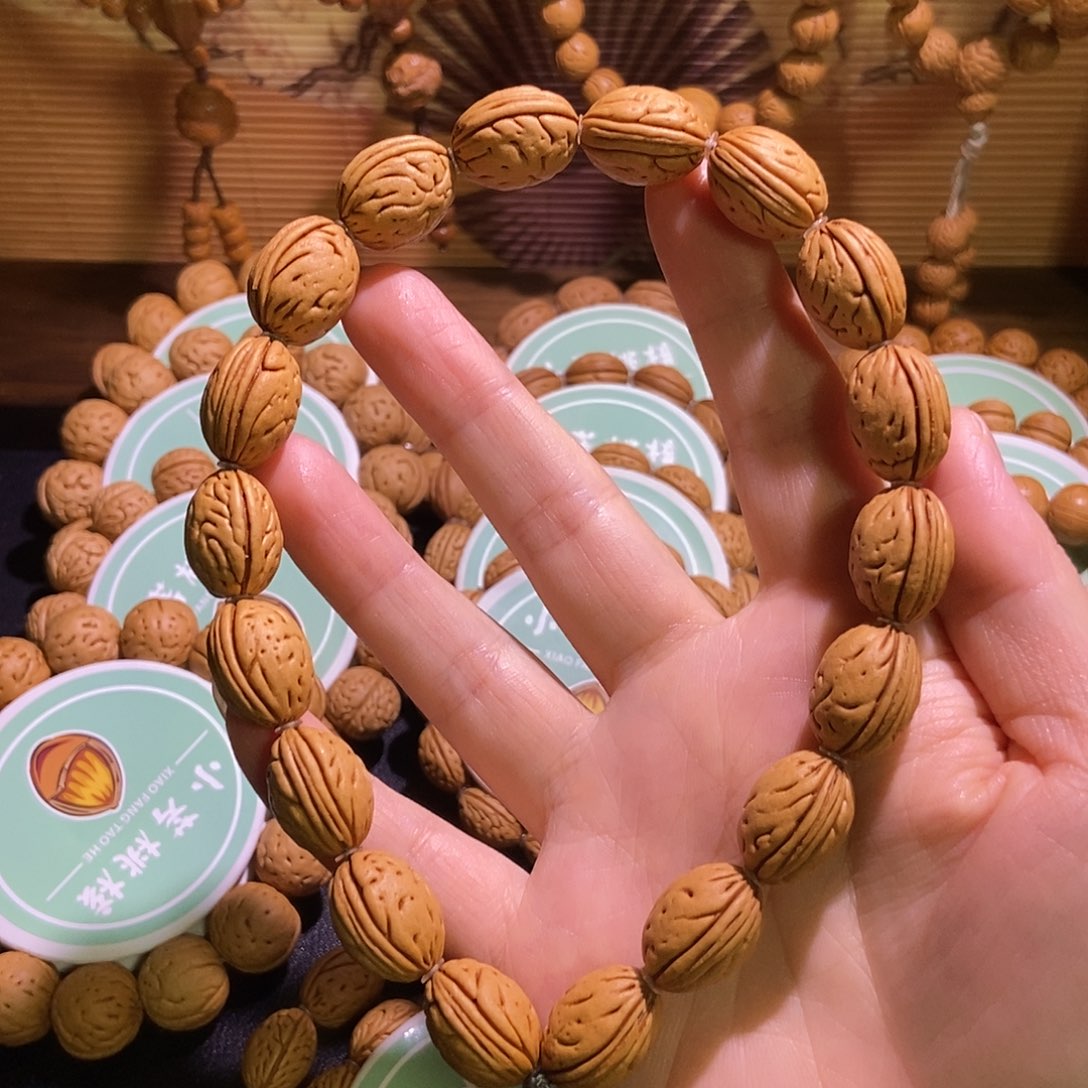 清***久桃核手串蜡皮钱袋子手持