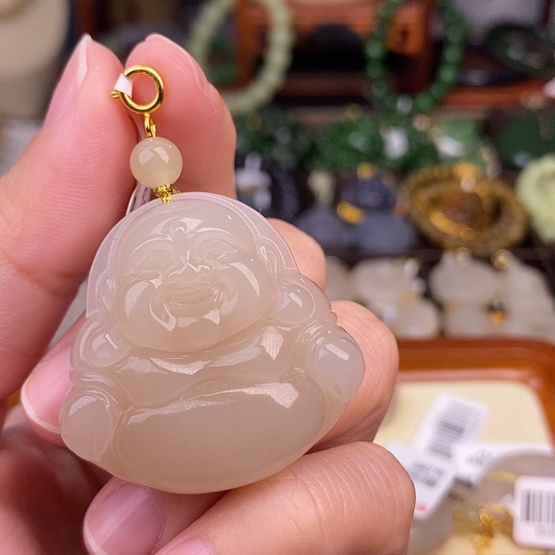 和田玉熟藕粉浓色佛公18.K金清货价未镶嵌