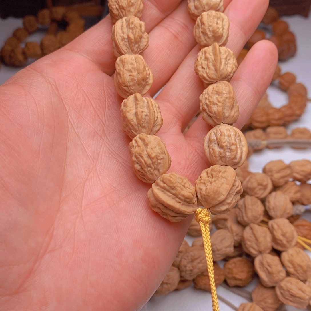 魏***为桃核手串蛤蟆头尺寸16三通款