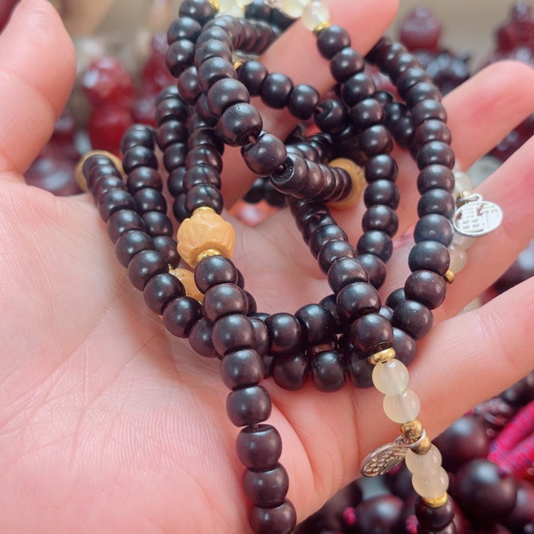 丹***晴香榧木瑕疵手串4条