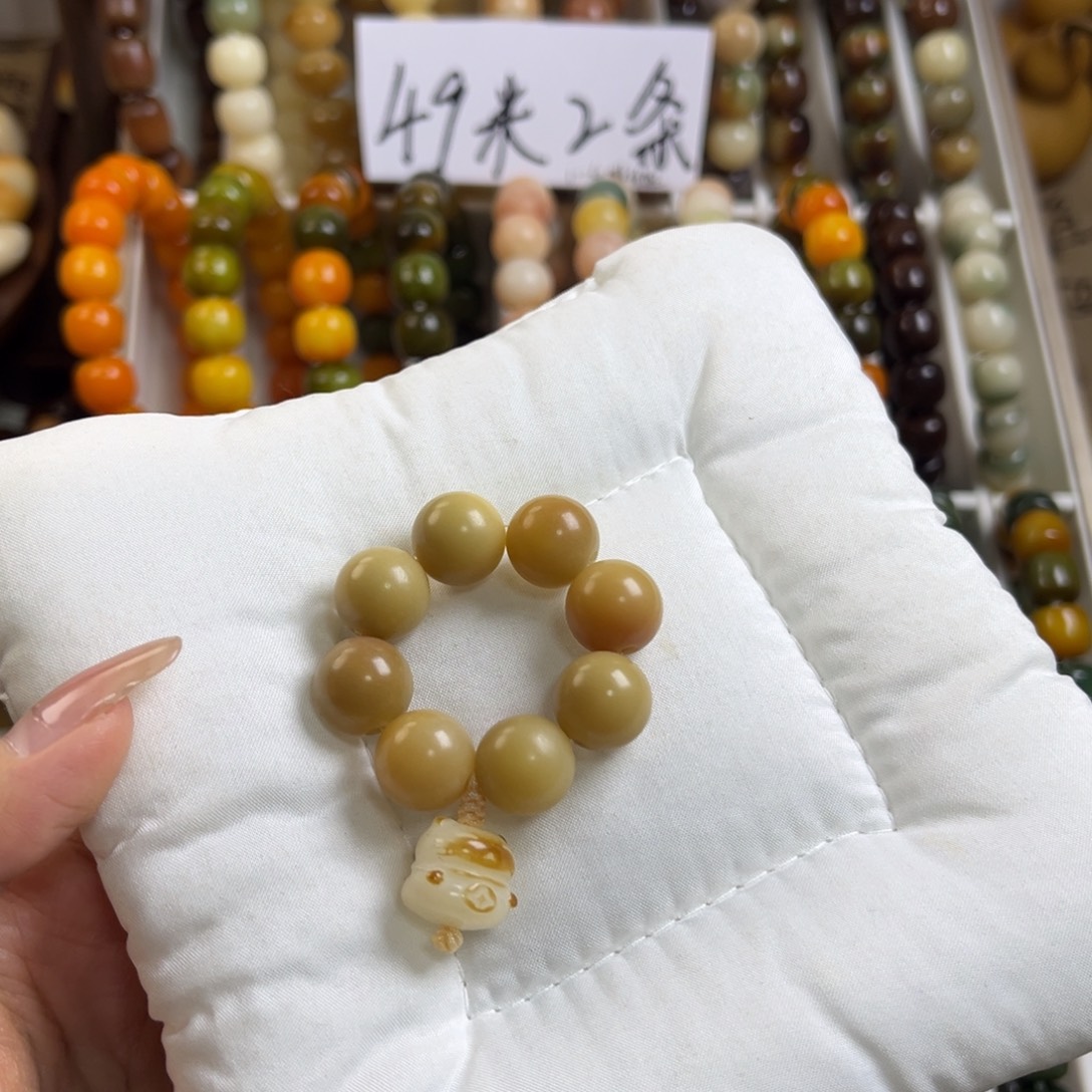 妞****手串菩提根/象牙果手捻