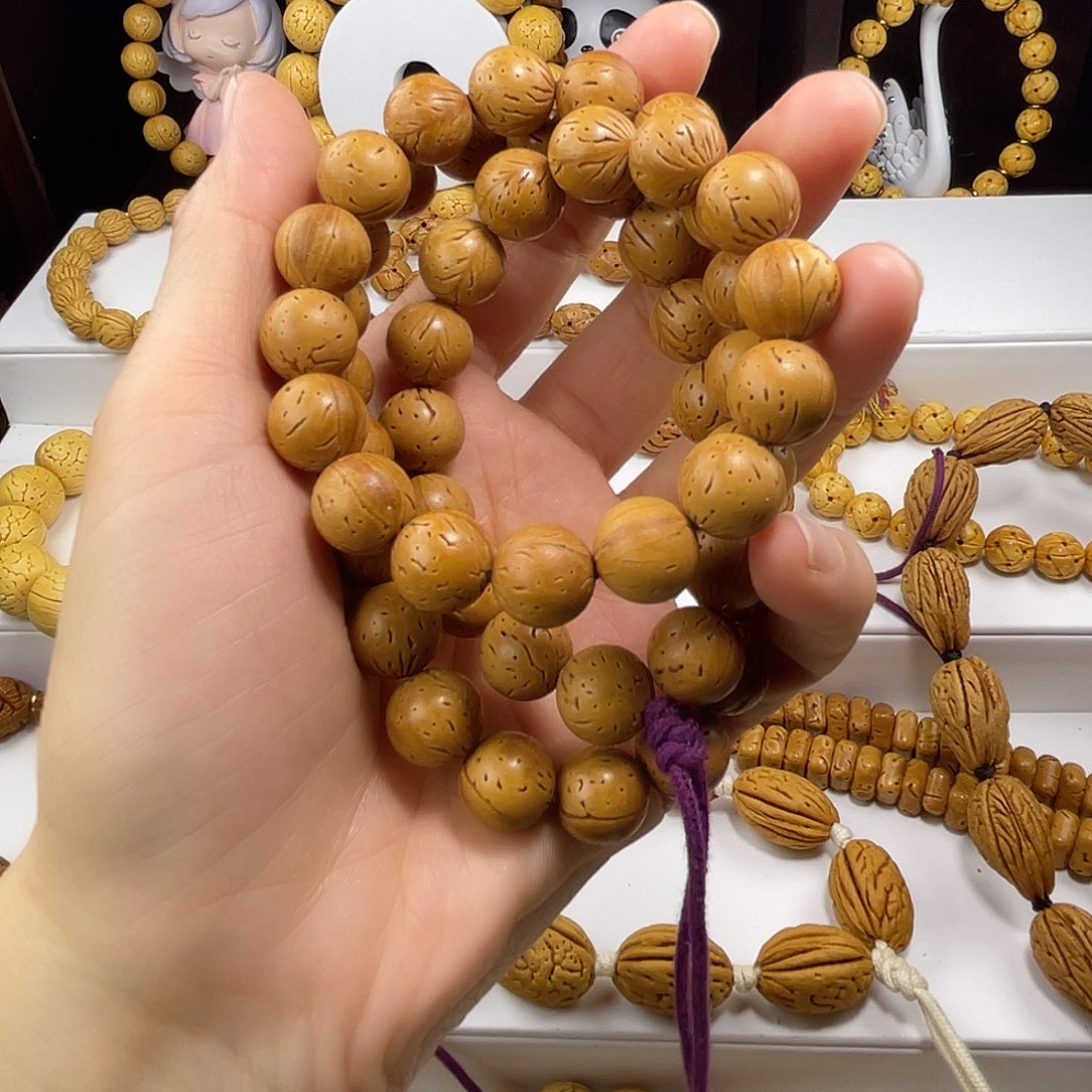 杨***哥东北脑纹桃核光珠手持加单圈