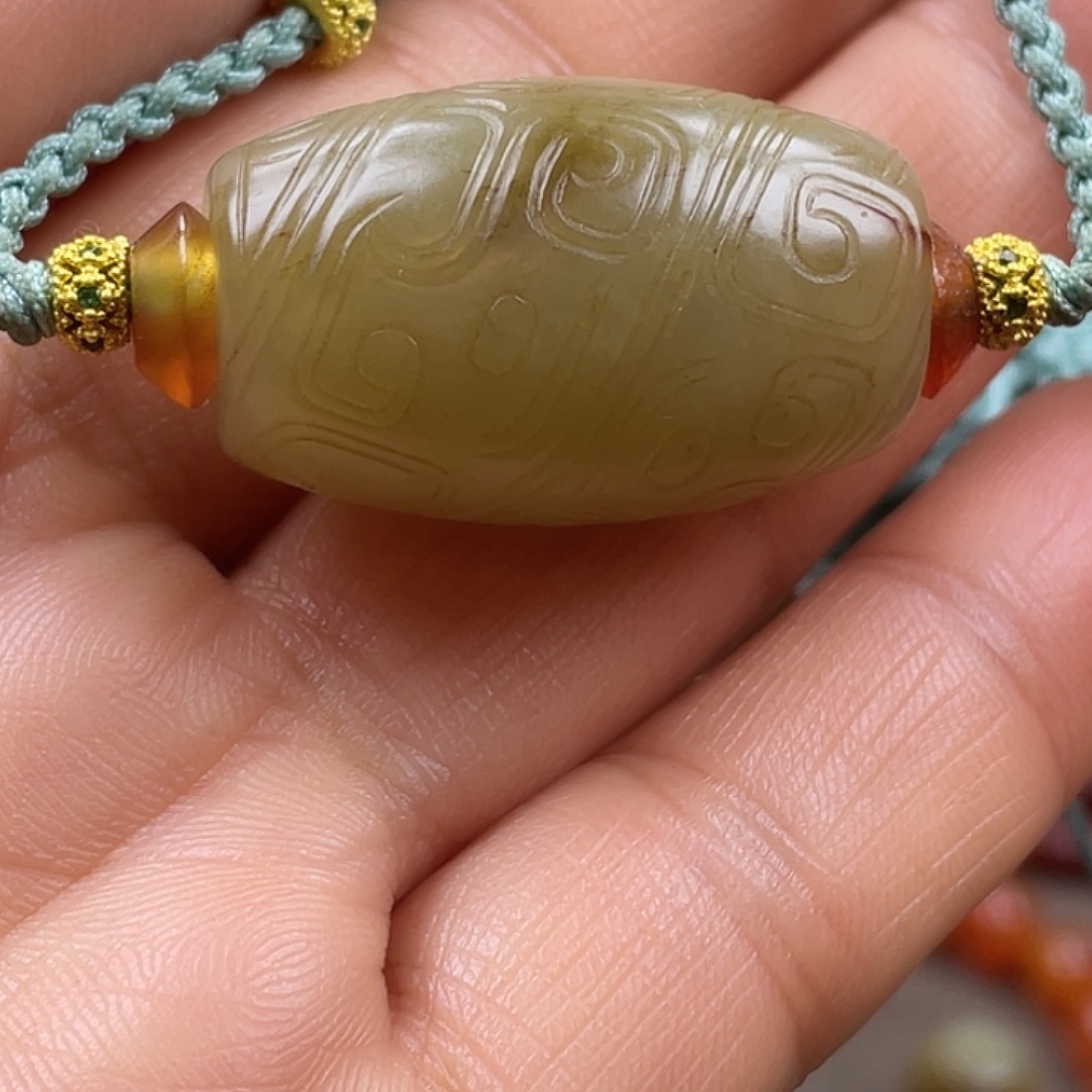 古***杏和田玉未镶嵌颈饰