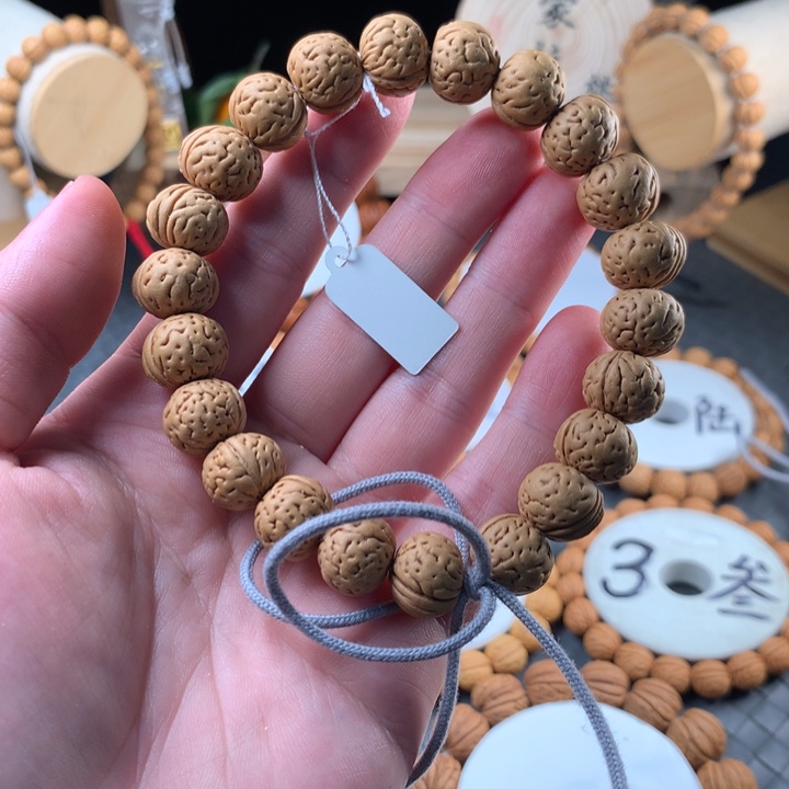 桃核手串元宝手持